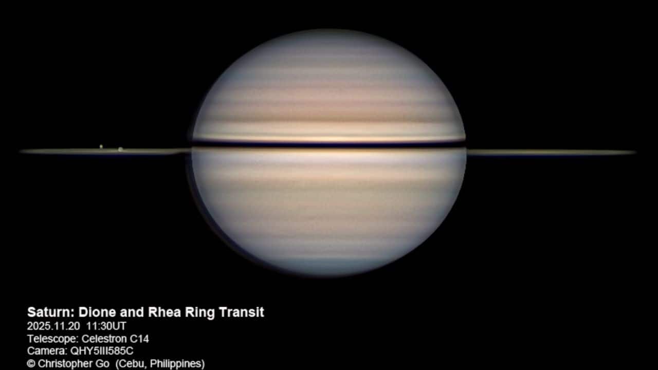 Dione and Rhea glide across Saturn’s nearly edge-on rings in this November view. Ring plane crossings briefly hide the thin rings, with the next series from Earth starting in 2038. (Image: Christopher Go/NASA)