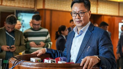 Union Minister of Parliamentary Affairs Kiren Rijiju speaks to the media.