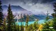 <strong>7. Peyto Lake, Canada</strong><br />Shaped like a wolf’s head, Peyto Lake is one of Banff’s most photogenic spots. Its brilliant turquoise tone changes with the seasons due to the glacier-fed minerals in the water. At sunrise, the lake glows like a polished gemstone—so vivid it feels digitally enhanced.