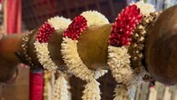 Jasmine and rose garlands close-up - Beautiful garlands of jasmine and red roses were prepared for the rituals. The floral arrangements reflected the couple’s classic South Indian aesthetic.