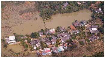 An aerial view of submerged houses in a flooded area caused by heavy rainfall following Cyclone Ditwah in Niyamgamdora, Sri Lanka. (Courtesy: Reuters photo)