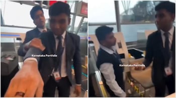 'What will you do?' the airline staff is seen asking the passenger aggressively. 'You will find me outside and do what?' (Image credit: @karnatakaportf/X)