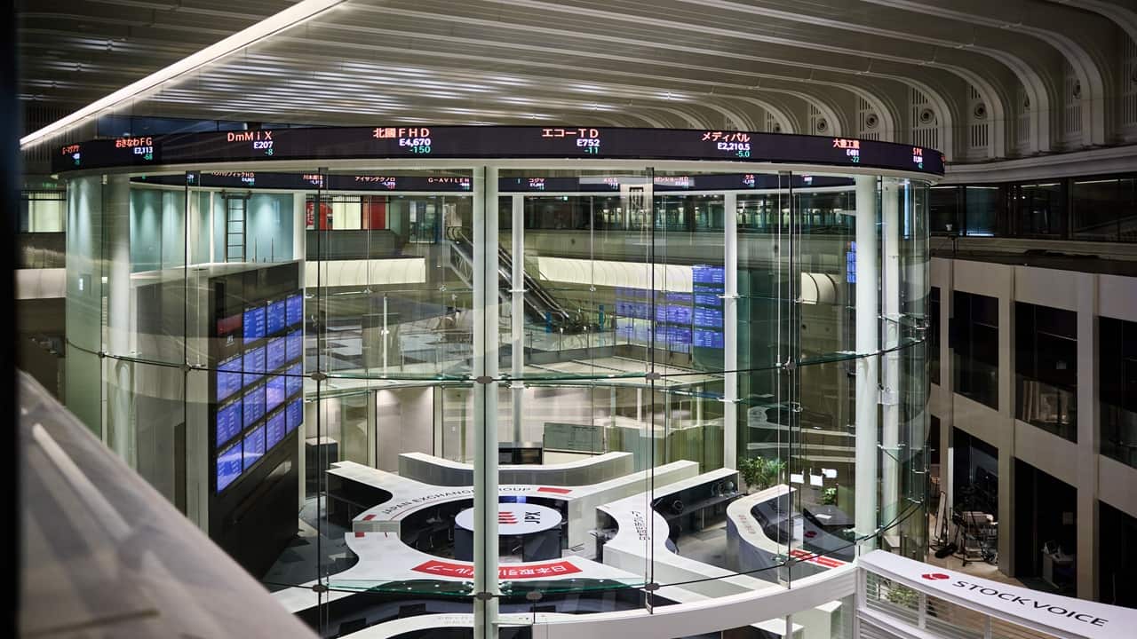 Stocks in Asia edge lower as Fed anxiety builds