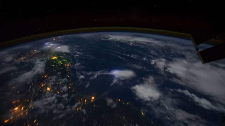 December 8: Flying over Earth at night, astronauts aboard the ISS witness clouds, city lights, lightning, seas, auroras, and sunrise every 90 minutes from low Earth orbit. (Image: Gateway to Astronaut Photography/NASA) December 8: Flying over Earth at night, astronauts aboard the ISS witness clouds, city lights, lightning, seas, auroras, and sunrise every 90 minutes from low Earth orbit. (Image: Gateway to Astronaut Photography/NASA)