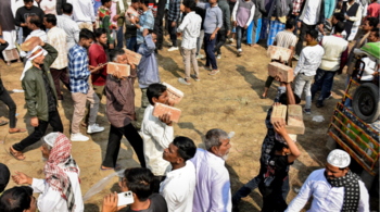 People carry bricks in view of former TMC MLA Humayun Kabir's plan to lay the foundation stone for a mosque, modelled on Ayodhya’s Babri Masjid, at Rejinagar in West Bengal’s Murshidabad district