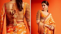 <strong>Ananya Panday</strong><br />The actress looks radiant as ever in a breathtaking handwoven Banarasi saree by Manish Malhotra. The orange drape features bird motifs and an intricate zardozi embroidered border. What steals the limelight are the Christmas-inspired motifs on the delicately embroidered choli.