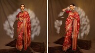 <strong>Tara Sutaria</strong><br />Țara loves sporting a saree and this shaadi season was no different. Her red Banarasi saree by Jayanti Reddy is a classic. The beautifully designed drape is paired with a hand-embroidered raw silk blouse, and she carries it with unmatched elegance.