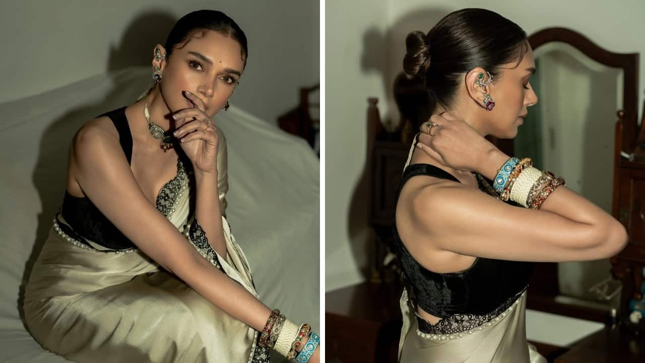 Aditi Rao Hydari: The actress added a vintage touch to her satin drape, decorated with a pearl and lace border, with the jewellery. It’s hard to overlook the delicate floral and leaf design of her earrings, which is even more mesmerising with its red and green colours. Aditi Rao Hydari: The actress added a vintage touch to her satin drape, decorated with a pearl and lace border, with the jewellery. It’s hard to overlook the delicate floral and leaf design of her earrings, which is even more mesmerising with its red and green colours.