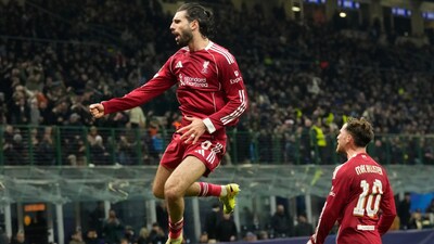 Liverpool's Dominik Szoboszlai celebrates after scoring against Inter Milan (AP Photo)