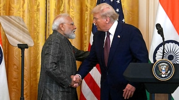 File photo of US President Donald Trump shaking hands with Indian Prime Minister Narendra Modi.