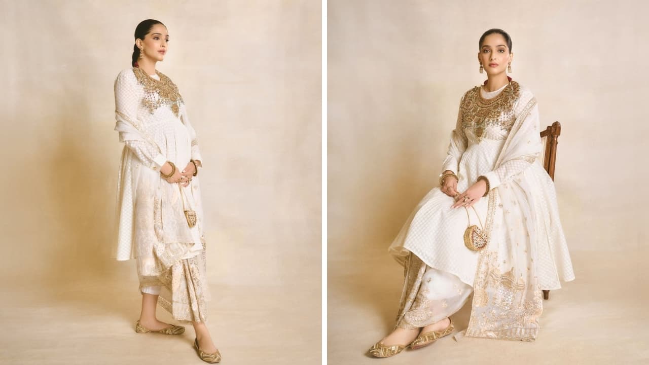 Channelling White Charm: She looks like a vision in this beautiful white ensemble by Rahul Mishra. It features a stunning hand-embroidered draped skirt and dupatta teamed with a Banarasi cut-work silk-cotton angarakha. It’s comfort blended with style. Channelling White Charm: She looks like a vision in this beautiful white ensemble by Rahul Mishra. It features a stunning hand-embroidered draped skirt and dupatta teamed with a Banarasi cut-work silk-cotton angarakha. It’s comfort blended with style.