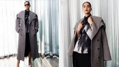 Keeping it Stylish: She may be pregnant, but that’s not stopping her from wearing pieces that look sharp and stylish. A printed top teamed with a black skirt and a long coat redefines winter chic. The Ferragamo fit is a classic case of wearing well-tailored pieces and sticking to minimalism. Keeping it Stylish: She may be pregnant, but that’s not stopping her from wearing pieces that look sharp and stylish. A printed top teamed with a black skirt and a long coat redefines winter chic. The Ferragamo fit is a classic case of wearing well-tailored pieces and sticking to minimalism.