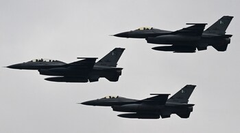 (FILES) Pakistan Air Force F-16 fighter jets perform at a rehearsal ahead of Pakistan's national day parade in Islamabad on March 21, 2024. (Photo by Aamir QURESHI / AFP)
