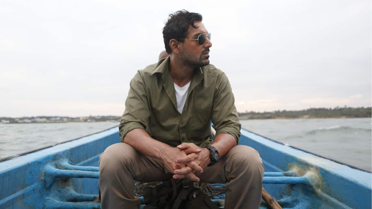 Madras Cafe John stars with Nargis Fakhri in this action thriller. The film revolves around Vikram, an Indian intelligence agent who visits Sri Lanka on a secret mission, finds himself embroiled in a civil war and a conspiracy to kill the former prime minister of India.