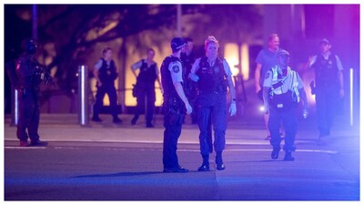 Police officers seen on street following a shooting incident at Bondi Beach, in Sydney, Australia,. (Courtesy: Reuters photo)