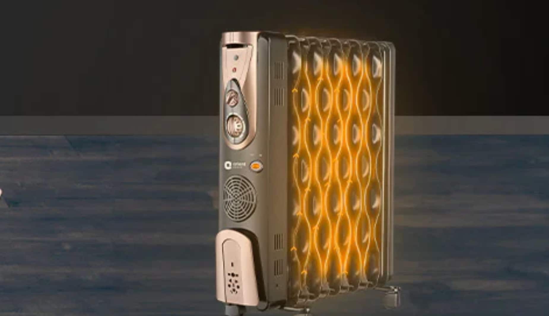 Orient Electric Comforter Room Heater: This 2900W oil-filled heater utilizes 11 unique S-shaped fins and a built-in PTC fan to spread warmth quickly and safely throughout large spaces. Orient Electric Comforter Room Heater: This 2900W oil-filled heater utilizes 11 unique S-shaped fins and a built-in PTC fan to spread warmth quickly and safely throughout large spaces.