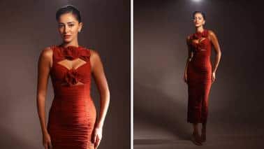 Ananya Panday: This may be a darker shade of red, but it’s hard not to love it for its stylish detailing. The florals stand out along with the drapes, and Ananya looks quite chic and party-ready. Her styling game is also pretty neat, making it perfect for Christmas.
