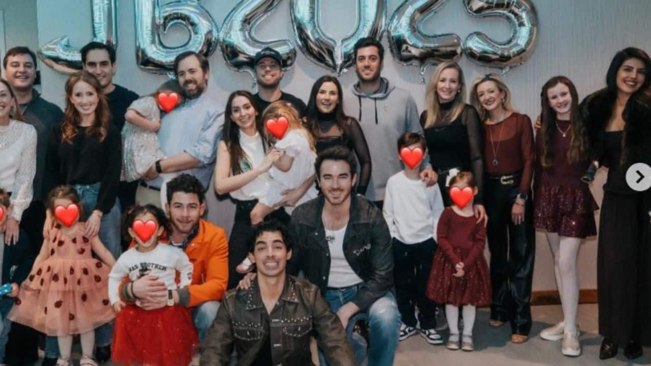 A heartwarming glimpse into the Jonas family’s holiday celebrations The image shared by Priyanka Chopra captures a large, cheerful family gathering celebrating the holidays together. The group poses indoors in front of shiny silver balloon letters spelling “JB2025,” suggesting a Jonas Brothers–themed New Year or holiday celebration. A heartwarming glimpse into the Jonas family’s holiday celebrations The image shared by Priyanka Chopra captures a large, cheerful family gathering celebrating the holidays together. The group poses indoors in front of shiny silver balloon letters spelling “JB2025,” suggesting a Jonas Brothers–themed New Year or holiday celebration.
