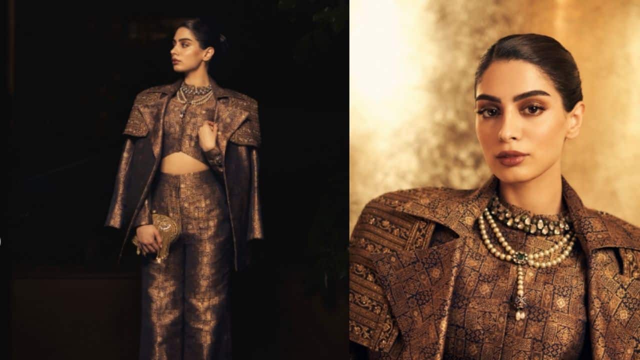 Khushi Kapoor Khushi unleashes her inner queen behaviour in a structured, metallic-toned outfit layered with a dramatic jacket. With that sleek bun, the high-key makeup with smokey eye, the pearl neck-piece, and the royal look serves as a perfect inspiration for a fashion-forward Christmas cocktail party where you’re not only an attendee, but royalty.