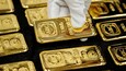 Gold steadies as traders book profits after rally to record