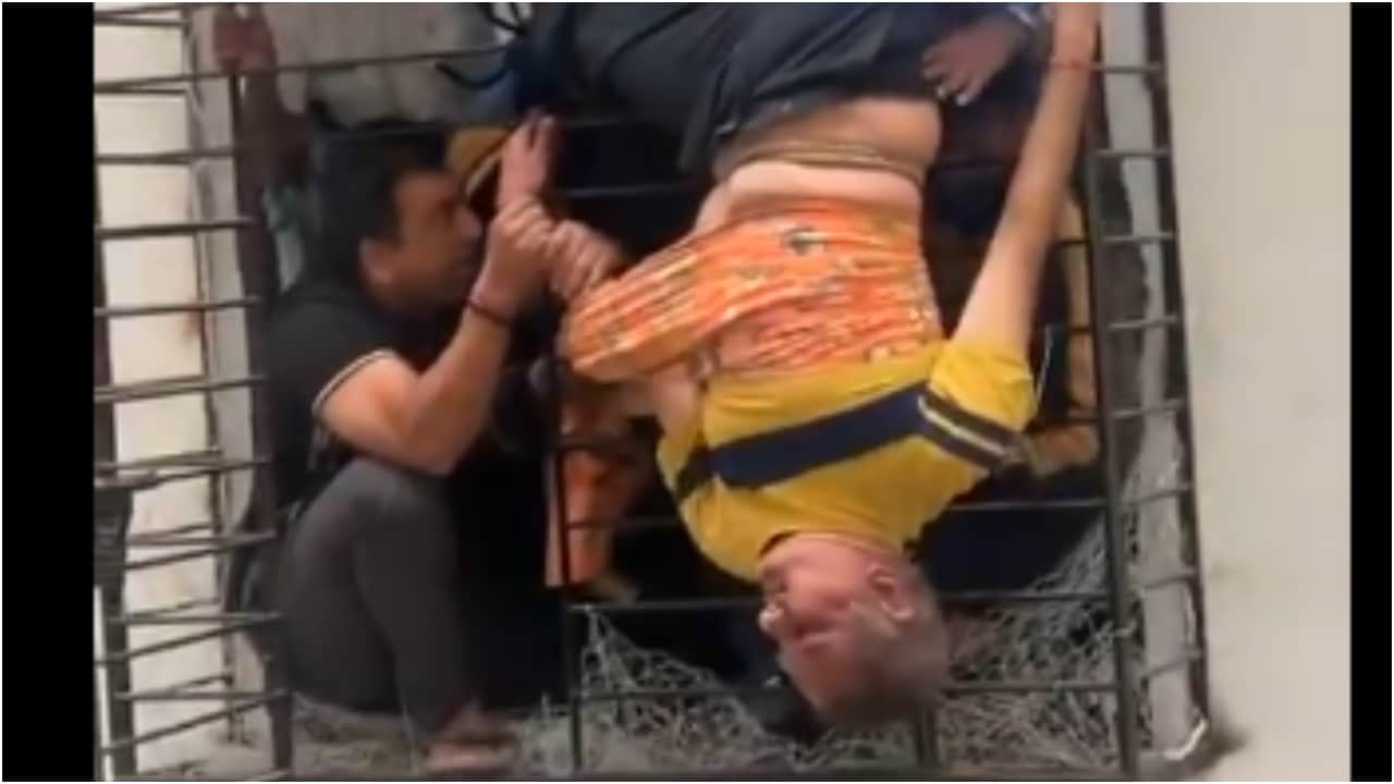 Surat man survives fall from 10th floor after being caught in window grill for nearly an hour. Video
