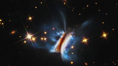 This image from the Hubble Space Telescope reveals the largest known planet forming disk surrounding a young star, stretching nearly 400 billion miles across, about 40 times wider than our solar system. (Image: NASA, ESA, STScI, Kristina Monsch (CfA); Image Processing: Joseph DePasquale (STScI))