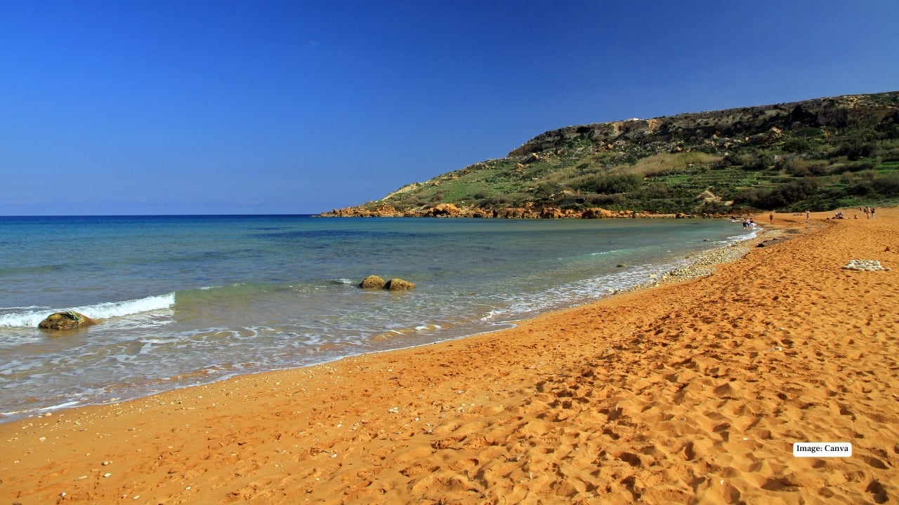 10. Ramla Bay – Gozo, Malta Ramla Bay’s burnt orange-red sand stands out sharply against the Mediterranean’s deep blue waters. The colour comes from high iron content in the soil, making it one of Europe’s most unusual beaches.