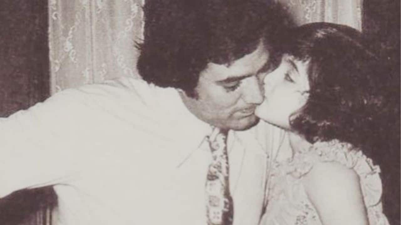 This black and white throwback picture shows a beautiful moment of father and daughter: Rajesh Khanna and his young daughter Twinkle Khanna as she leans in to kiss him on the cheek. The veteran actor looks calm and loving and not as a mega star but just a caring and loving dad.   The ease and innocence of younger Twinkle Khanna adds warmth to the picture, making it feel deeply personal rather than posed.