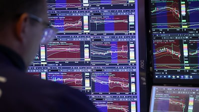 A trader works on the floor of the New York Stock Exchange (NYSE) in New York, US, on Monday, Dec. 29, 2025. US stocks extended losses as traders pared bets on tech megacaps before the end of the year.