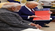 A personal note from US President Donald Trump as he presents a book to the Prime Minister at the White House. (Image: narendramodi.in)
