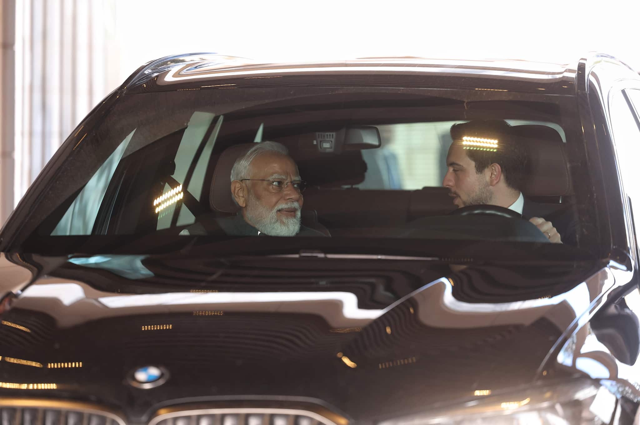Beyond protocol: Jordan’s Crown Prince Al-Hussein bin Abdullah II personally drives PM Modi to the Jordan Museum in Amman. (Image: narendramodi.in)