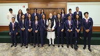 One with the winners: PM Modi strikes a pose with the Indian Women's Cricket Team Players on their World Cup win at 7, LKM, in New Delhi. (Image: narendramodi.in)