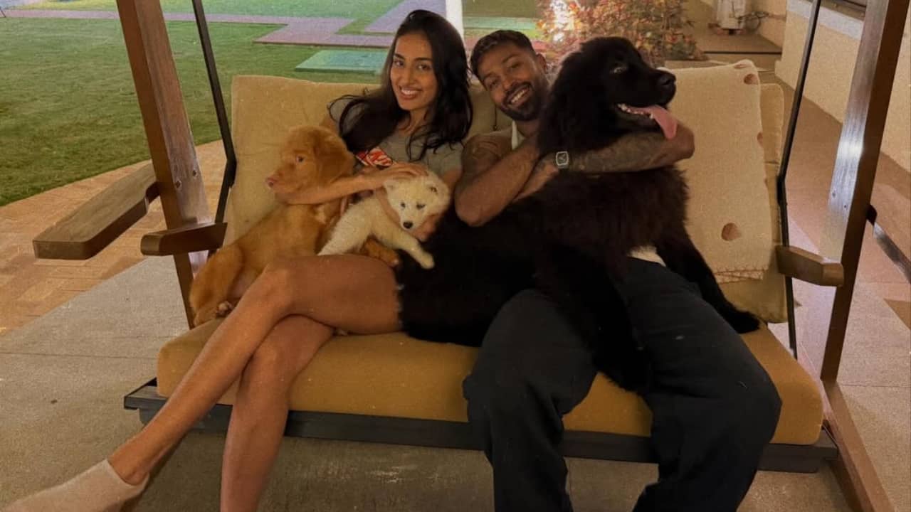 7. Pets as family, not accessories - One of the most heartwarming aspects was the presence of their dogs. Whether cuddled on the couch or carried around playfully, the pets added a layer of softness to the celebration. It reminded viewers that for them, family includes four-legged companions too.