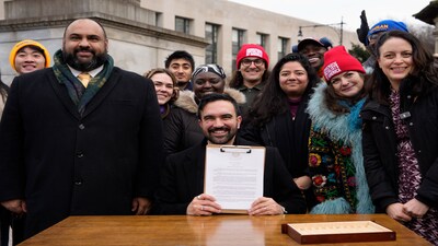 New York Mayor Zohran Mamdani displays a signed executive order at Grand Army Plaza in New York on Jan. 2. Photographer: Adam Gray/Bloomberg