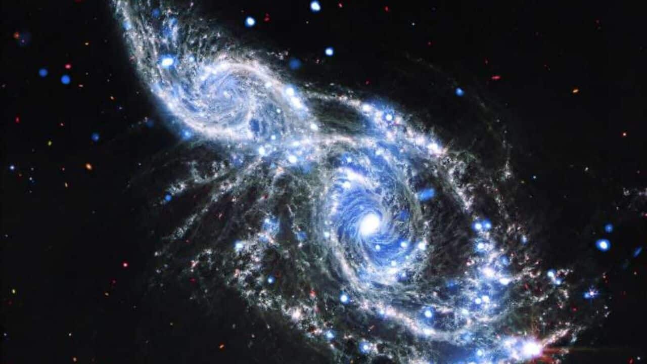 JWST captures spiralling galaxies on a slow-motion collision course