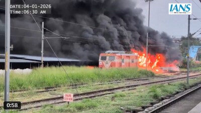 A spark from an electric line that fell on a two-wheeler parked with a cover on it, was suspected to be the cause of fire.