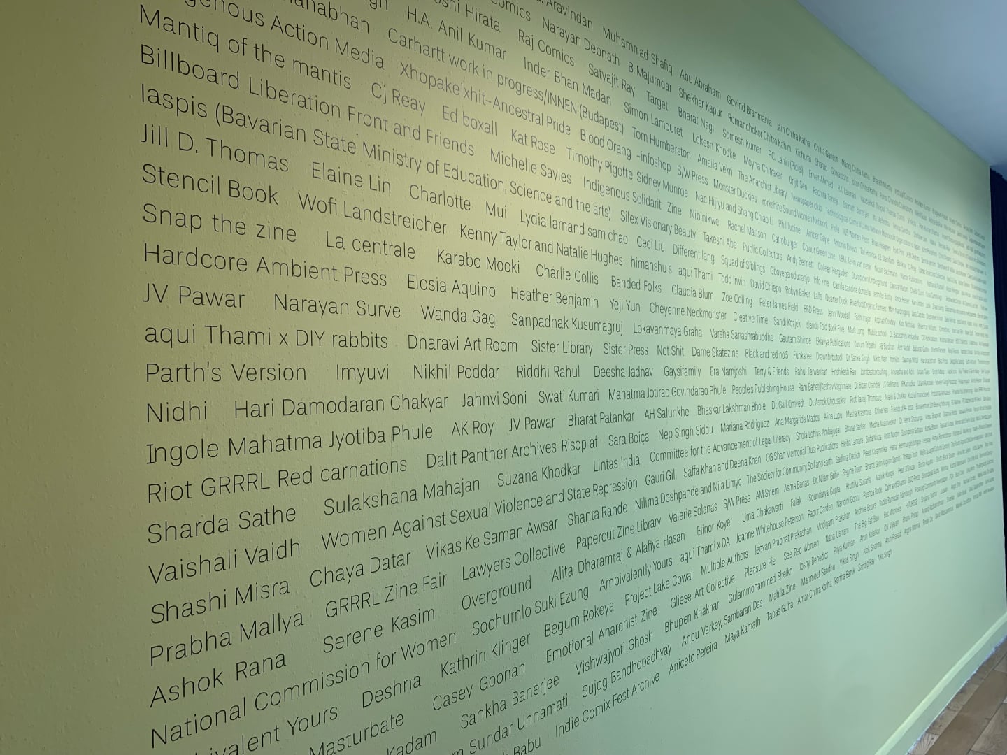 Credits for the comic books section take up an entire wall at the exhibition.