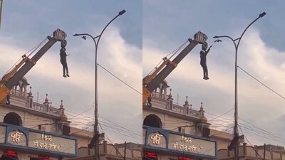 Punjab man hangs from crane to save trapped bird. (Image: @gharkekalesh/X)