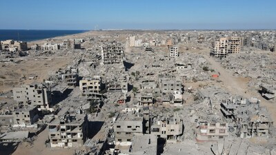 An aerial view shows the Al-Maqussi Towers district, heavily damaged by massive Israeli bombardment over the past two years, in northwestern Gaza City on October 15, 2025, during a US-brokered ceasefire between Israel and Palestinian factions. (Photo by AFP)
