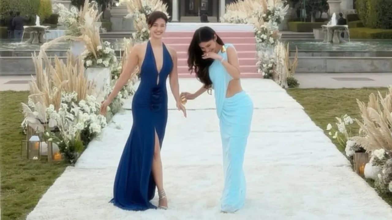 Celebrity Guests The event was attended by close friends from the industry, including Disha Patani and Mouni Roy. Disha wore a deep navy blue gown with a high slit, while Mouni opted for a light blue, modern, draped saree, both looking glamorous on the white carpet.