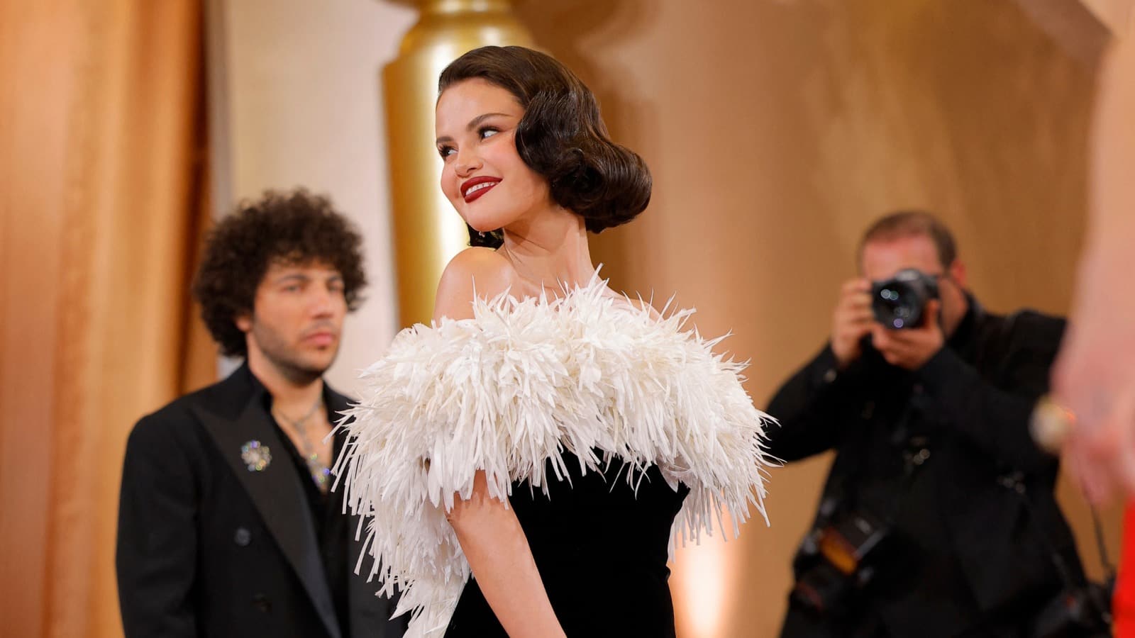 Benny Blanco sweetly gazes at his wife Selena Gomez at the Golden Globes 2026 (Reuters/Daniel Cole)
