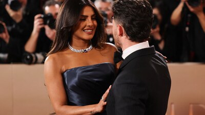 Priyanka Chopra with Nick Jonas at Golden Globes 2026 red carpet. (Photo: Reuters) 