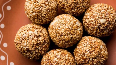 Sesame and jaggery dominate India’s winter festivals for a reason. Discover how til-gud supports warmth, energy and health during Sankranti, Pongal and Bihu.  (Image: Pinterest)