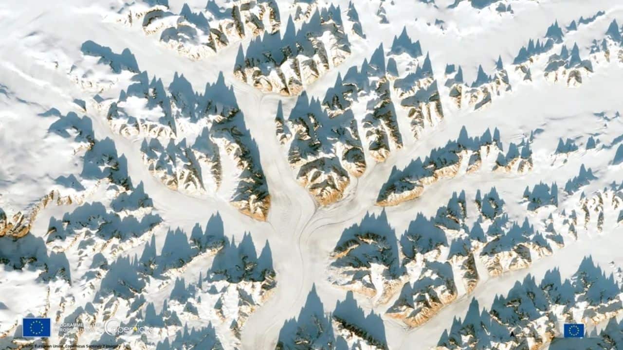 Satellite Sentinel‑2 captures Greenland’s snowy peaks—But there is something wrong beneath