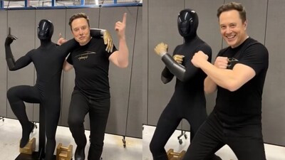 Elon Musk dances with  Tesla’s humanoid robot. (Image: @elonmusk/X)