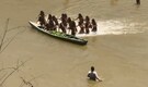 ‘Which way is the arrow coming from?’ World-first footage shows uncontacted Amazon tribe lowering weapons