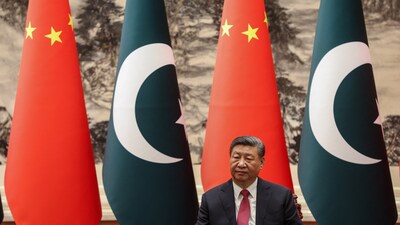 Chinese President Xi Jinping arrives for a signing ceremony with Pakistani President Asif Ali Zardari (not pictured) in the Great Hall of the People in Beijing on February 5, 2025. (Photo by WU HAO / POOL / AFP)