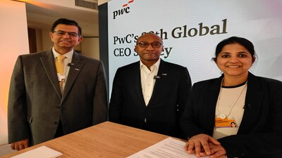 Sanjeev Krishan, Chairperson, PwC India (L), Mohamed Kande, Global Chairman, PwC. (Centre) and Moneycontrol's Chandra R Srikanth