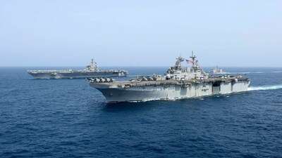 US-Iran Tensions Soar: Trump Warns of 'Massive Armada,' Tehran Threatens 'Finger on the Trigger'
