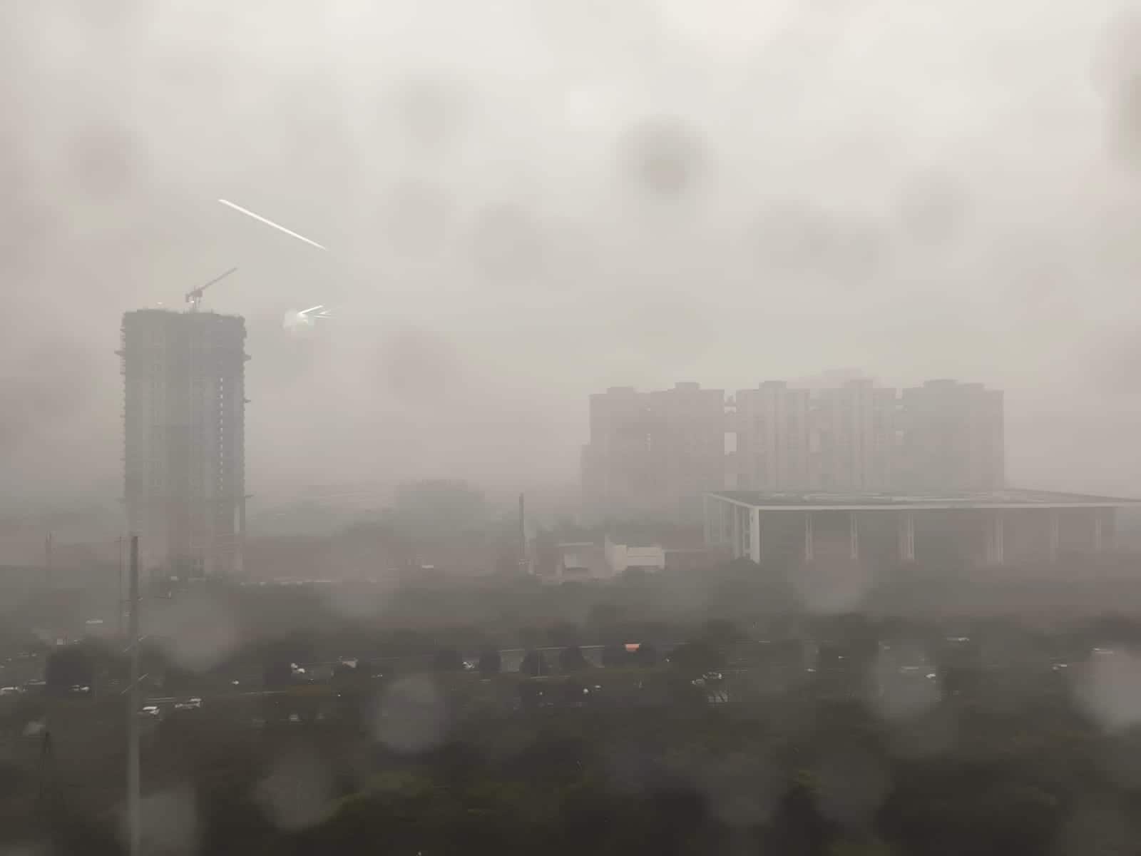 Watch: Delhi-NCR plunges into darkness at noon amid thunderstorms as icy chill sweeps in from hills